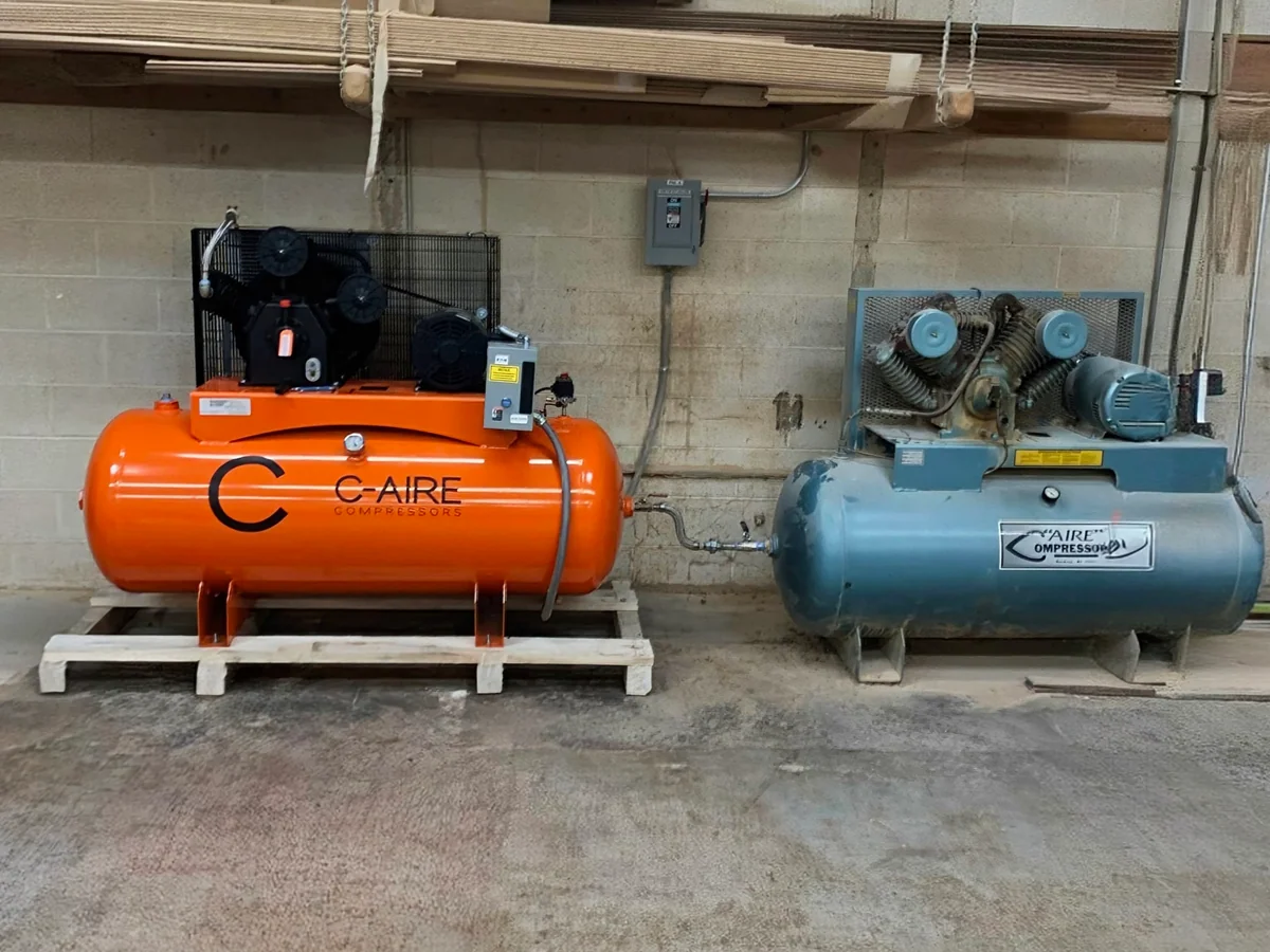 C-Aire A100H120 Fully Packaged Piston Compressor installed at Wood Products Shop in Lakeville, MN